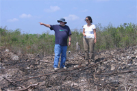 Turner (left) and student setting up a transect to examine deforestation in southern Yucatan